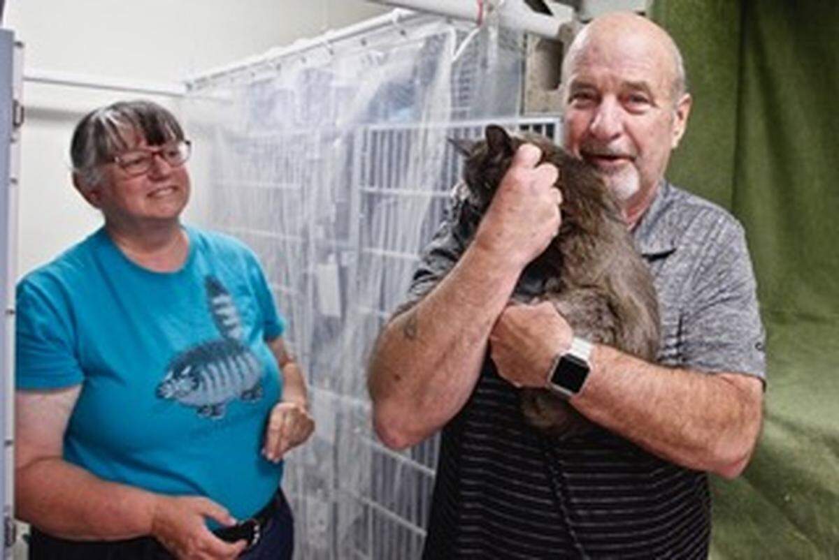 HART Medical Director Evelyn Zanella, left, helped reunite Gracey the cat with owners Rick Hutchins and Clare Austen, not pictured, of Tucson, Arizona, after the couple lost the pet while camping at San Simeon State Park campground.