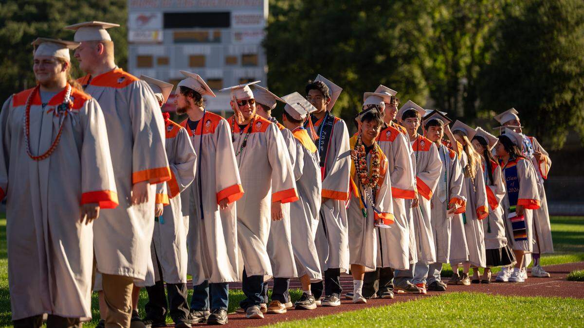 Atascadero High School students wait in line for their diplomas at commencement ceremonies on Wednesday, June 3, 2026. 296 seniors walked the stage and received their diplomas.