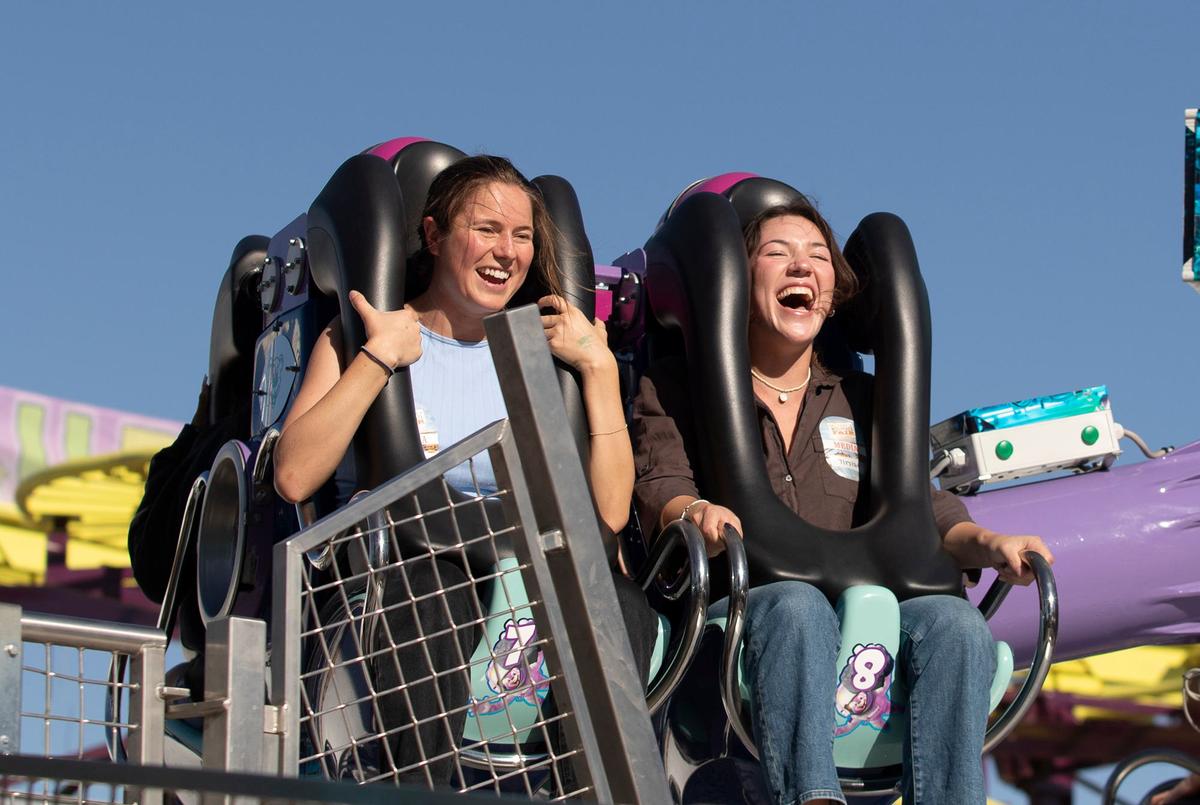 Tribune reporters Chloe Shrager and Kelsey Oliver take on this year’s rides, games and food at the 2024 Mid-State Fair. The Paso Robles fair opened Wednesday, July 17, 2024. Oliver, left, and Shrager scream and laugh on Black Out ride.