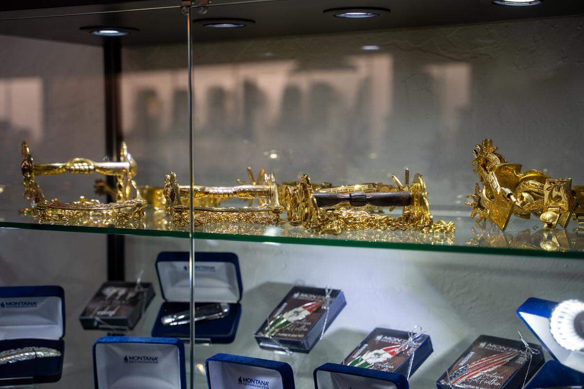 Gold spurs sit in a case at Salinas Charreria & Western Wear on Tuesday, Jan. 27, 2026. Salinas Charreria & Western Wear opened its San Luis Obispo location Jan. 3 and has proved a hit already, drawing large crowds on opening day.