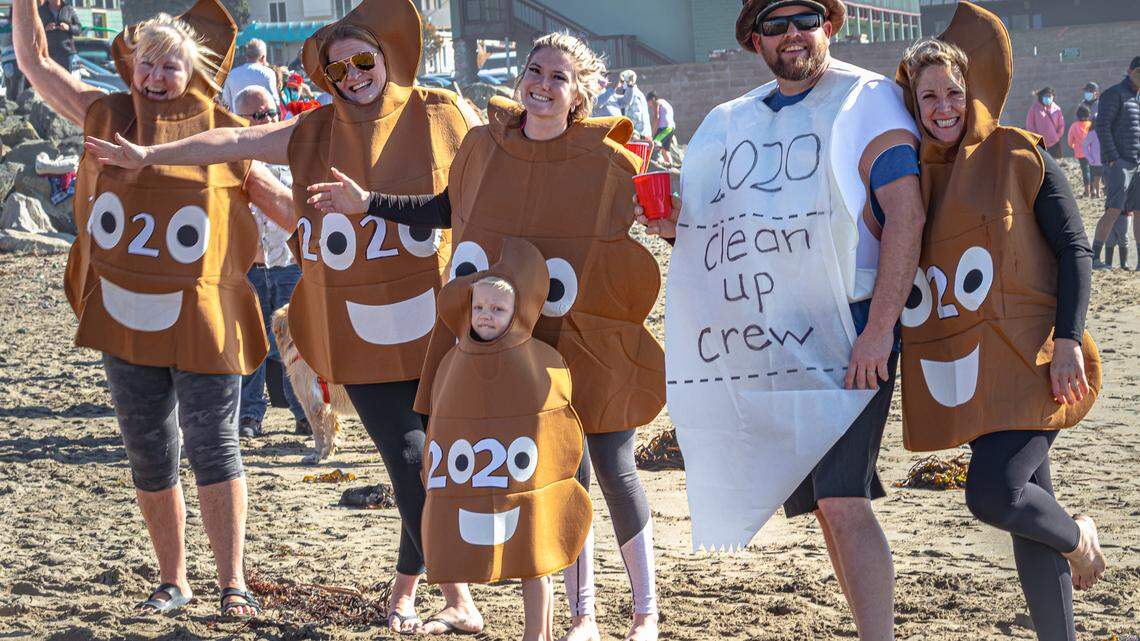 More than 200 people turned out Friday in Cayucos for an unofficial New Year’s Day polar bear dip. The official event was canceled due to the COVID-19 pandemic. This group chose a colorful theme to express their opinion of 2020.