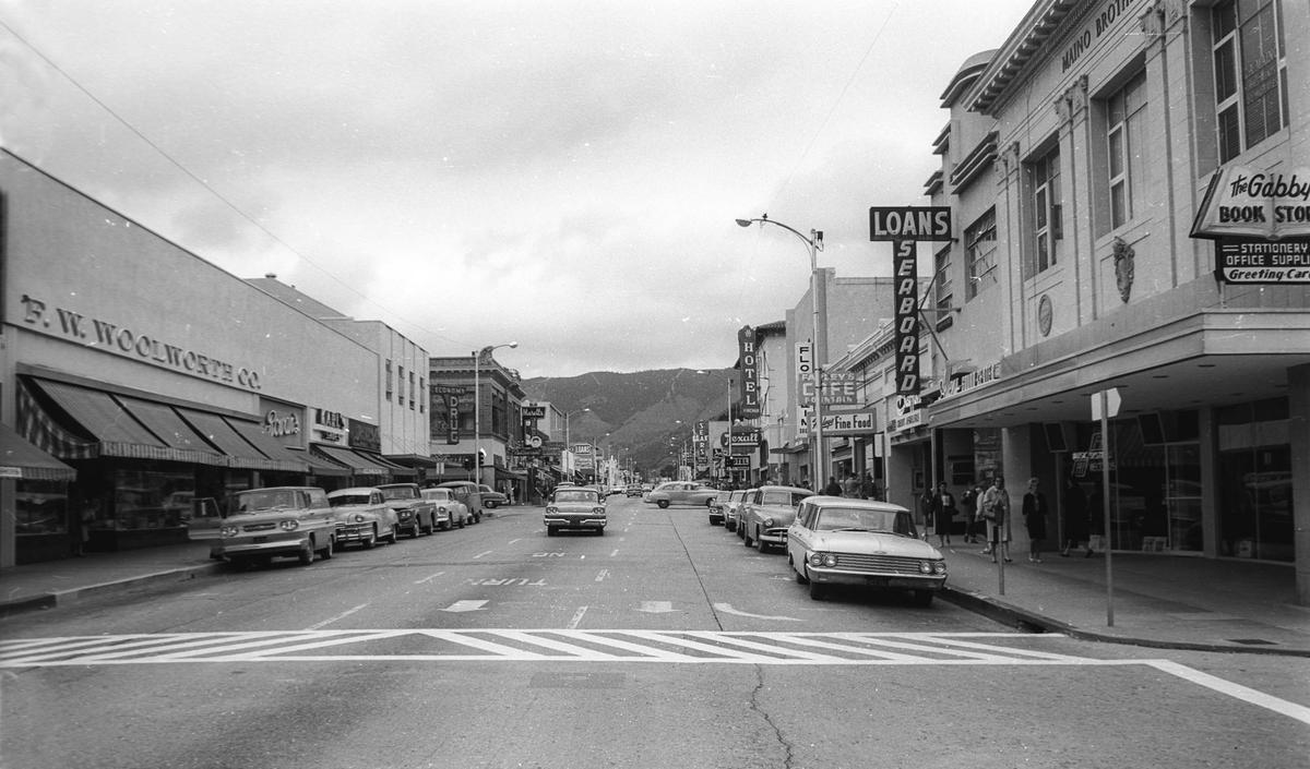 A view of San Luis Obispo on Higuera Street looking East, with the Maino Building at right and Woolworth’s (now The Network Mall) about March or April 1963.