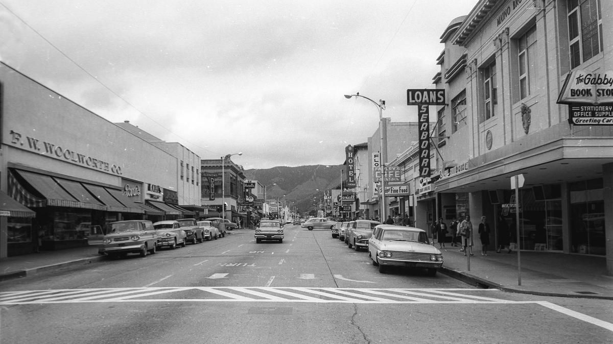 A view of San Luis Obispo on Higuera Street looking East, with the Maino Building at right and Woolworth’s (now The Network Mall) about March or April 1963.