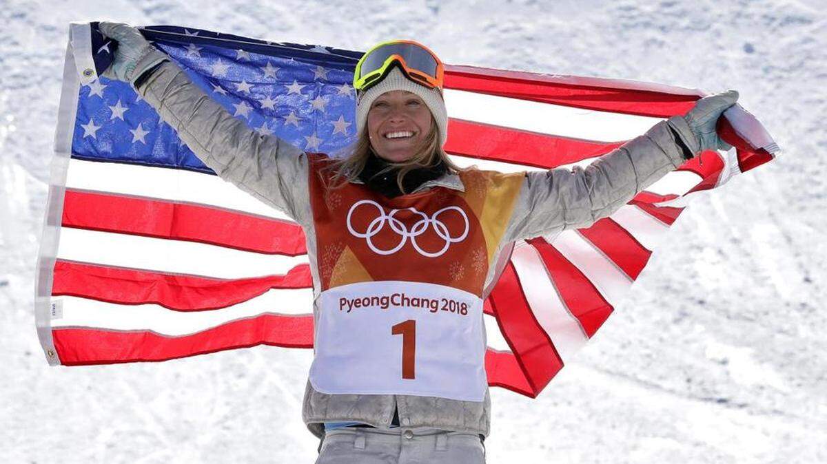 Jamie Anderson poses during the victory ceremony for the Snowboard Ladies' Slopestyle Final on day three of the Pyeongchang 2018 Winter Olympic Gameson Mon., Feb. 12, 2018, in Pyeongchang-gun, South Korea.