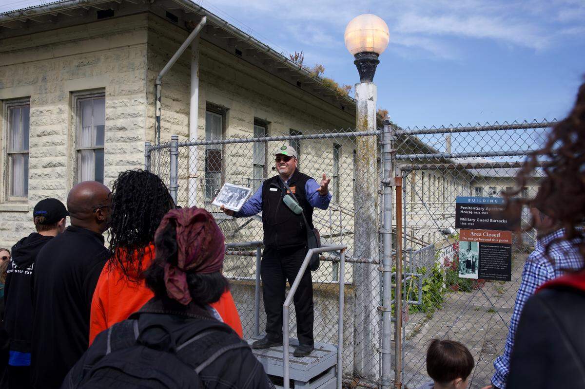 A ranger shares the history of the national park at Alcatraz Island on Friday, May 16, 2025, in San Francisco, California. Following staffing reductions by the Department of the Interior, national parks are grappling with uncertainty regarding the future of their ranger-led programs.