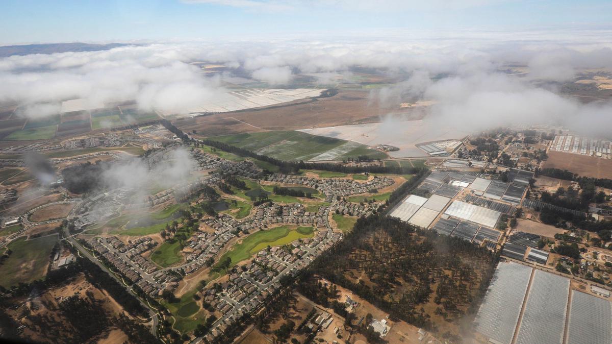 Fog breaks over the Monarch Dunes Golf Club in the Nipomo area. 
