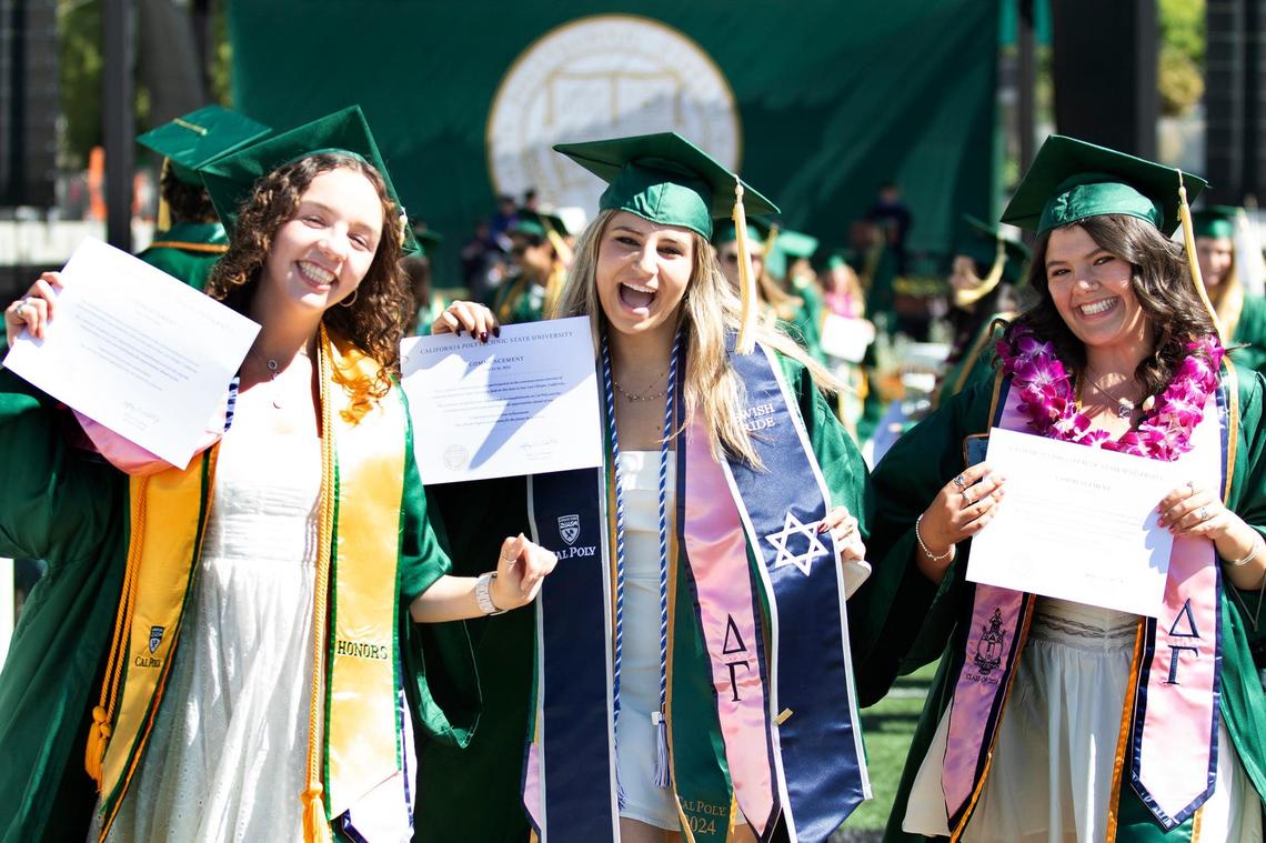 Cal Poly kicked off graduation weekend with three ceremonies on June 15, 2024. The university expects to celebrate more than 6,300 graduates throughout the weekend. Olivia Hanley, Animal Science, Hilla Ben-Moshe, Nutrition Science and Ardani Fairchild, Wine and Viticulture, all proudly display their diplomas,