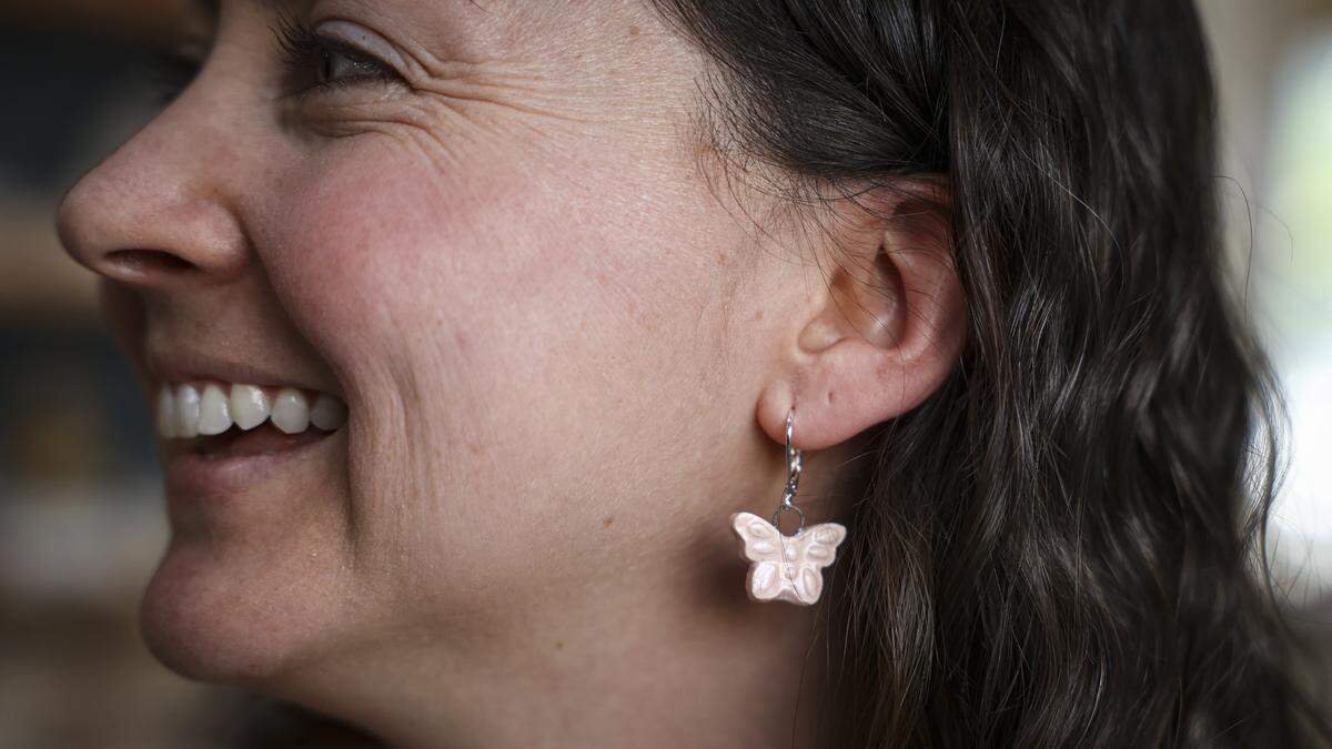 Amy Loschiavo is making butterfly earrings seen here on Dec. 4, 2025. A portion of the proceeds will go to helping threatened monarch butterflies.