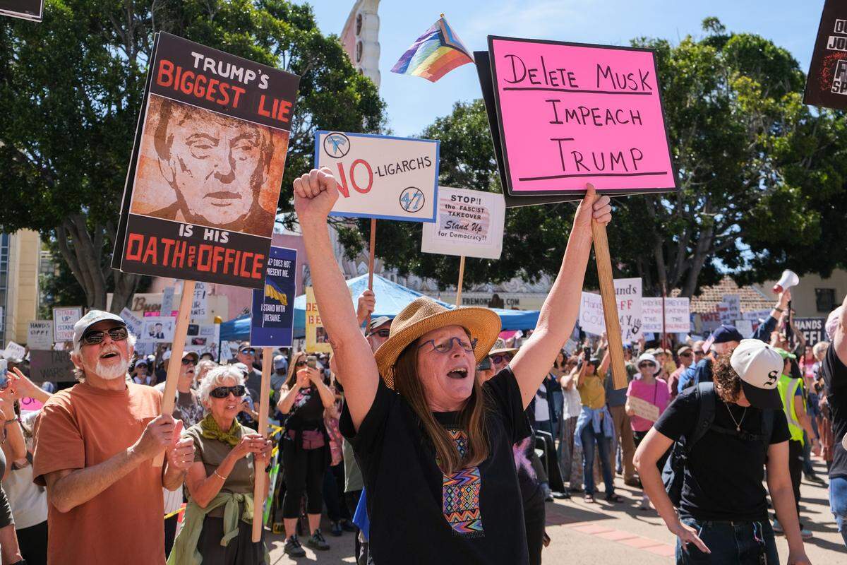 Around 5,000 people cheer as California congressman Salud Carbajal speaks at the “Hands Off!” rally at San Luis Obispo Superior Court on April 5, 2025.