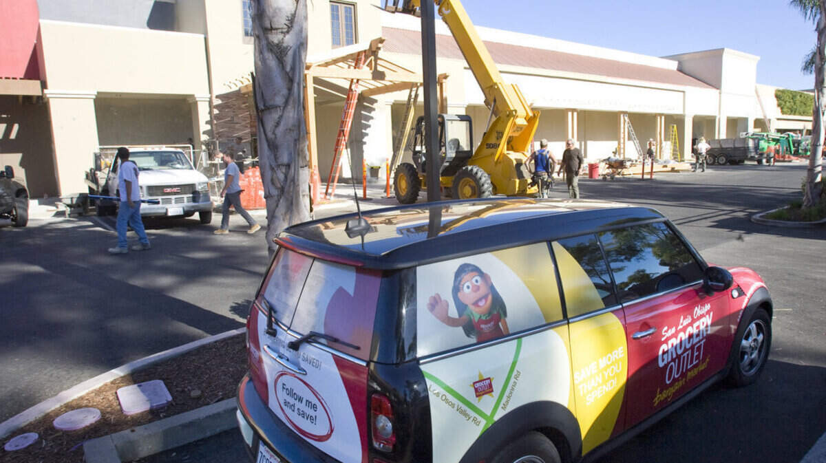 Crews work on the new Grocery Outlet store in the former location of Spencer's Fresh Market at Madonna and Los Osos Valley roads in San Luis Obispo.