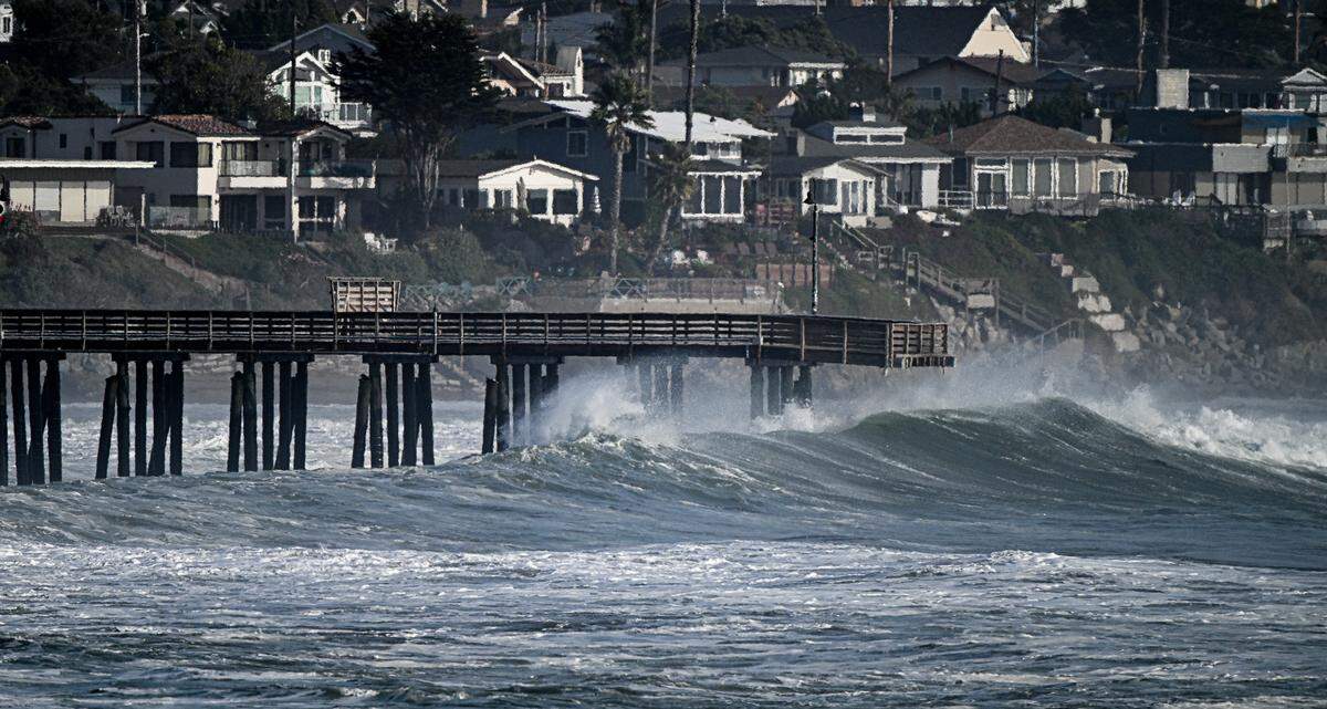 Powerful waves pounded the San Luis Obispo County coast on Dec. 23, 2024, even ripping a piling from the base of the Caycuos Pier. A view from Estero Bluffs State Park shows the waves.