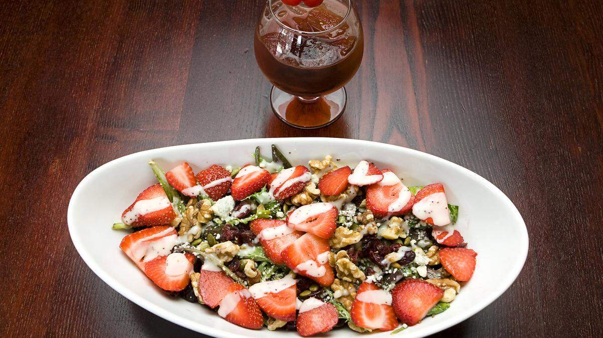 A strawberry salad is served with a Kahlua cocktail at The Dish in Paso Robles.