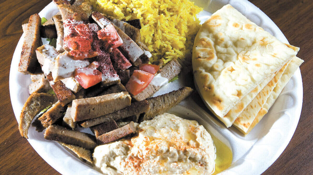 The gyro plate at Jaffa Café — which has locations in Arroyo Grande, Paso Robles and San Luis Obispo — includes rice, pita bread and hummus.