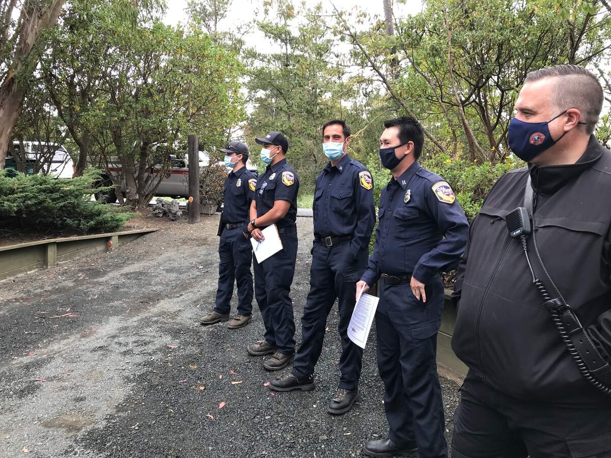 A veritable troop of firefighters helped columnist Kathe Tanner figure out what should be done at her Cambria property to get it ready for wildfire season. From left, they are Cal Fire firefighters Chris Laethem and Josiah Martinez, Captain Monte Phelps, forestry expert John Gee and Cambria Fire Department Chief William Hollingsworth.