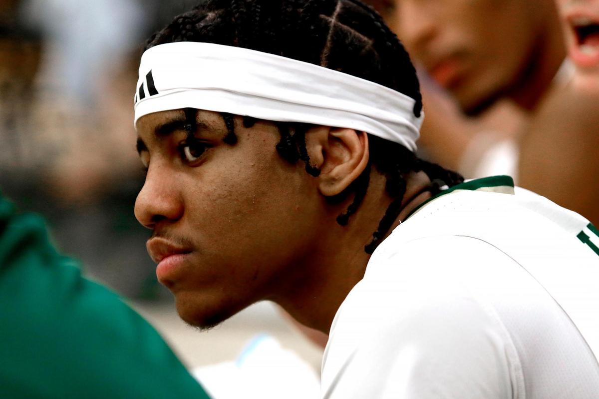 Cayden Ward watches from the bench during a Cal Poly basketball game against Cal State Bakersfield, Saturday, March 1, 2025, at Mott Athletics Center.