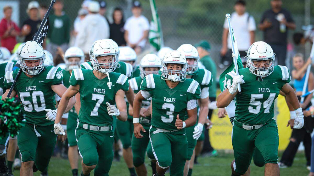 Eagles take the field from the left: Ethan Lane, River Waltmire, Bennett Orradre, Johnny Peschong. Templeton won 42-0 over West (Bakersfield) in a high school football game Sept. 15, 2023.