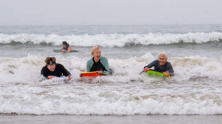 ‘Who doesn’t love a mermaid?’ Viral Pismo boogie board club inspires women of all ages