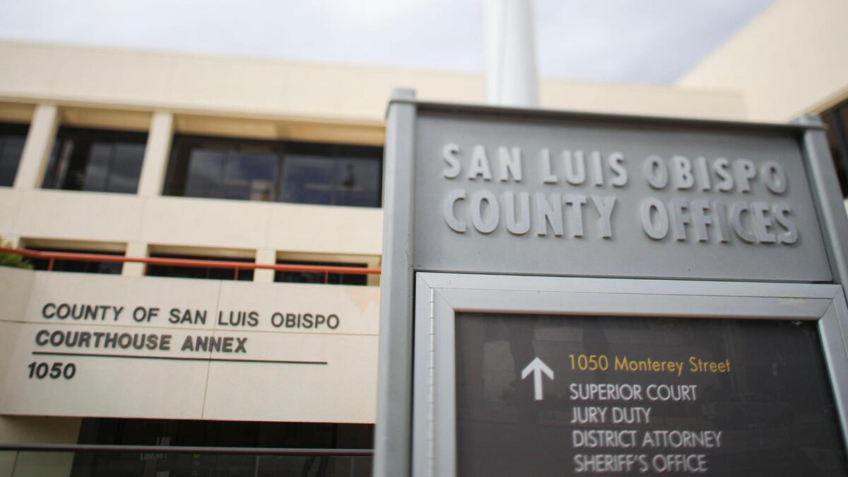 The front entrance and sign at the San Luis Obispo Courthouse.