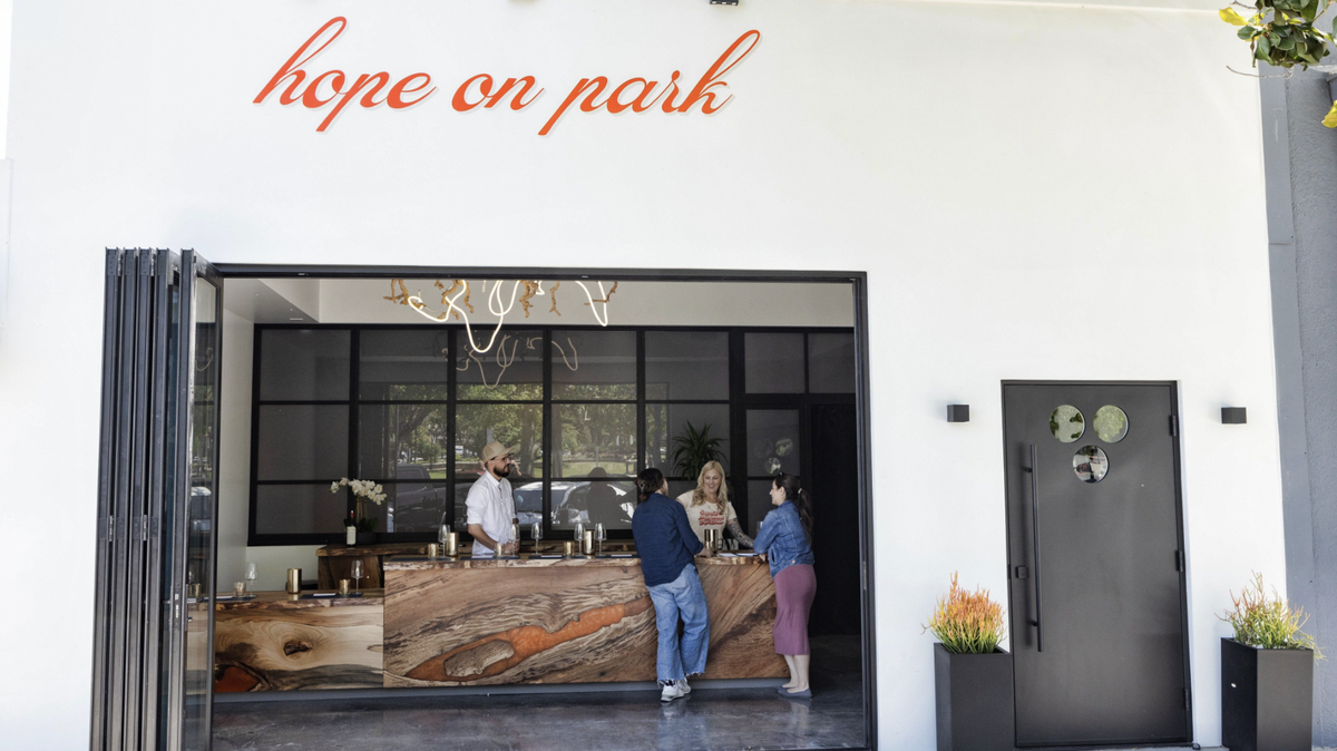 Hope On The Park’s takes walk-ins at its sidewalk tasting bar with a selection of the family top-of the line local wines.