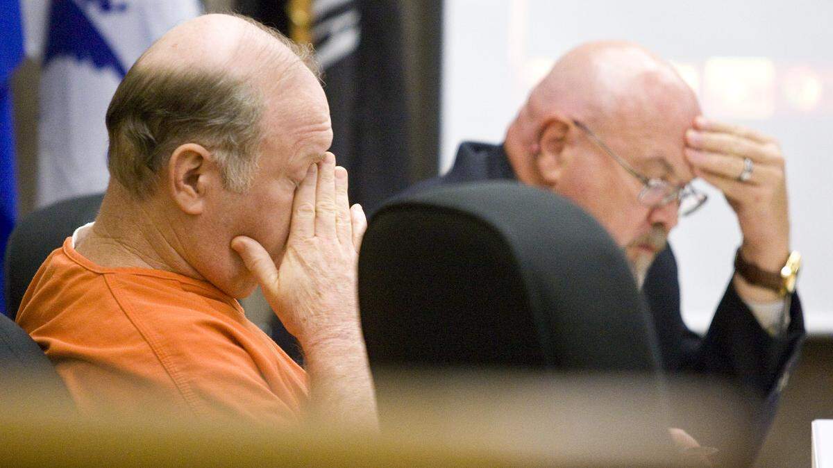 Philip Thomas Hanes, 58, covers his face in court in October during a replay of a 911 call from live-in girlfriend Tina Marie Beddow, 32. His attorney, Ilan Funke-Bilu is at right at the preliminary hearing. The Templeton man is charged with murder in the fatal stabbing.