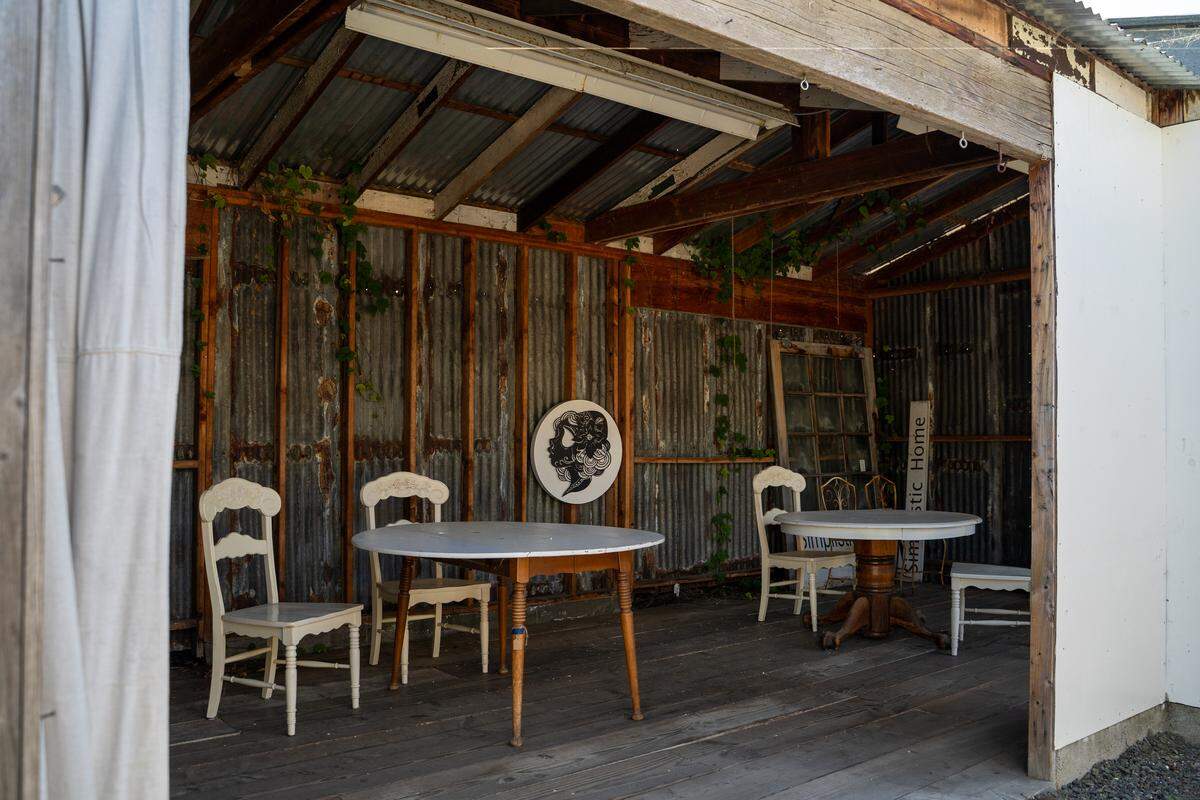 Salty Pages, a new bookstore in Cambria, features seating outdoors, seen here on Wednesday, March 25, 2026. The bookstore opened on March 20 with a collection of around 300 books to start.