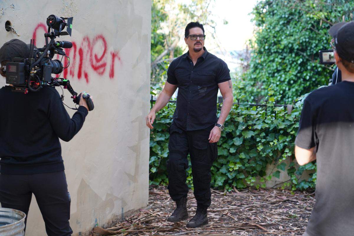 A film crew captures Zak Bagans, star of “Ghost Adventures,” while he investigates the Rispin Mansion property in Capitola.