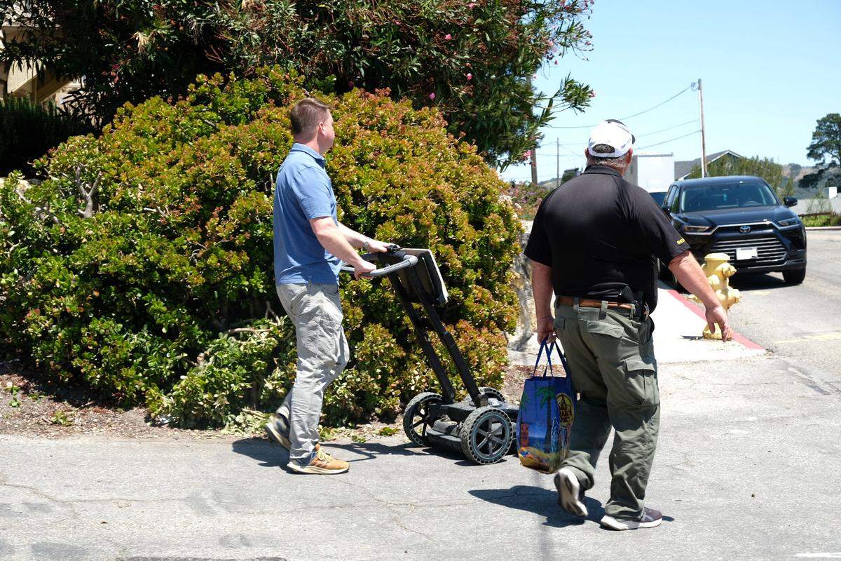 A ground penetrating radar is wheeled into the backyard of Susan Flores’ home in Arroyo Grande on Thursday, May 7, 2026, during the second day of a search warrant investigation in the Kristin Smart murder case.