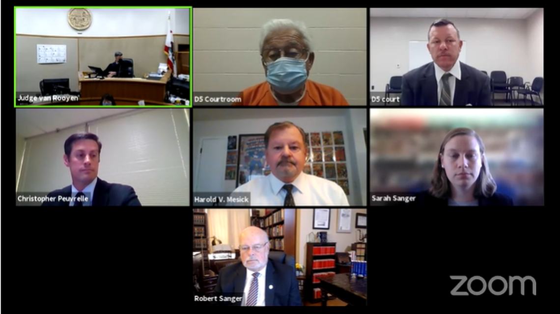 San Luis Obispo Superior Court Judge Craig van Rooyen, upper left, presides over the arraignment Monday, April 19, 2021, of Ruben Flores, top center, and Paul Flores, top right The Floreses were taken into custody and booked into San Luis Obispo County Jail last week on suspicion of the murder of Kristin Smart. At center left is Deputy District Attorney Chris Peuvrelle, Ruben Flores’ attorney Harold Mesick at center, and Sara Sanger, representing Paul Flores, center right. Robert Sanger, also representing Paul Flores, in the bottom frame.
