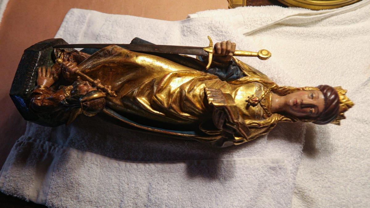 A 16th century statue of St. Catherine standing over Maximilian and holding a sword waits to be returned to the walls of the Casa Del Mar guest house on April 6, 2022. The house was the Hearst residence while Casa Grande was being built. Preparations are being made to reopen Hearst Castle after COVID restrictions are lifted.
