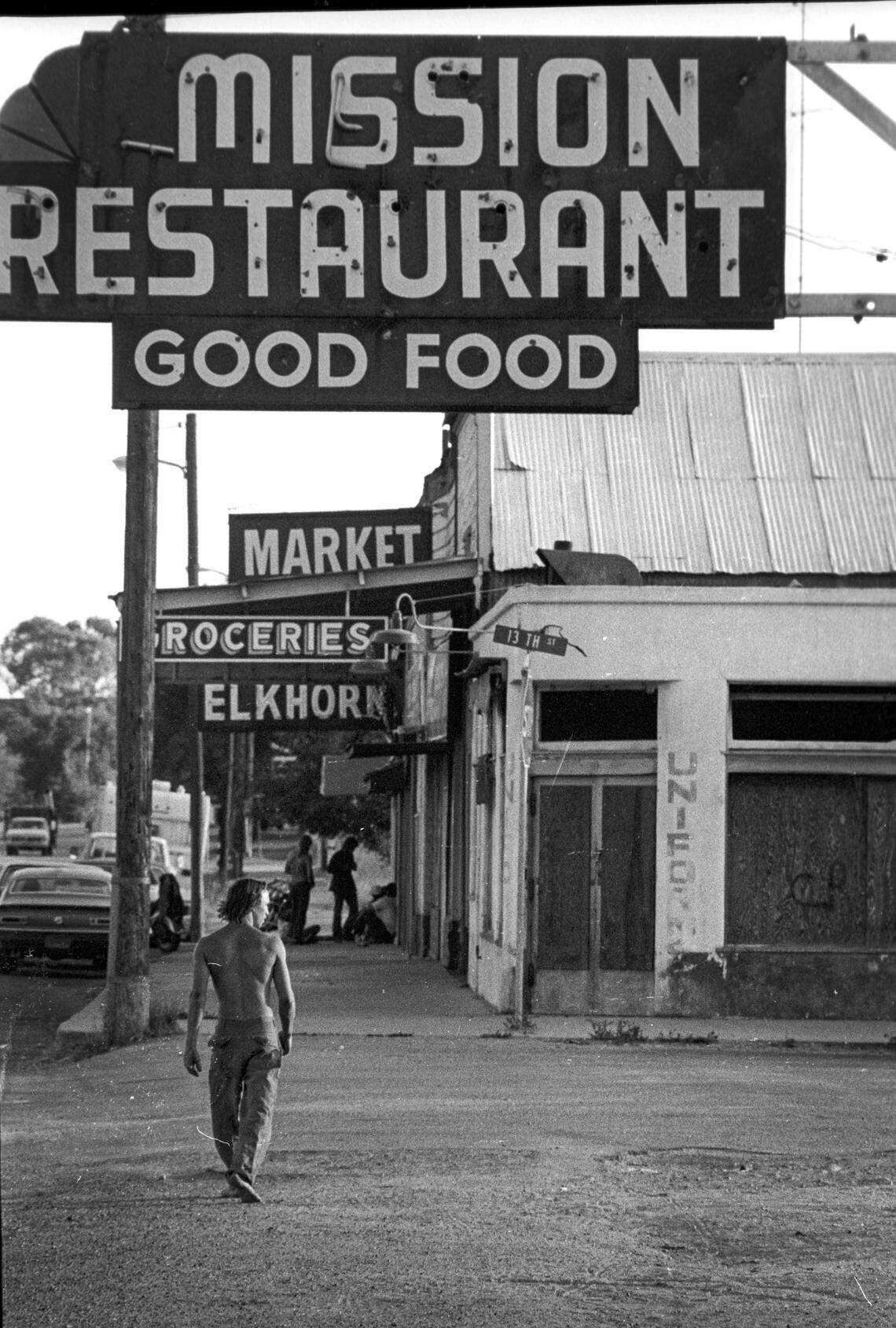 Neon signs dating to the 1940-50s boom-era lined Mission St. in San Miguel on Sept. 19, 1980.