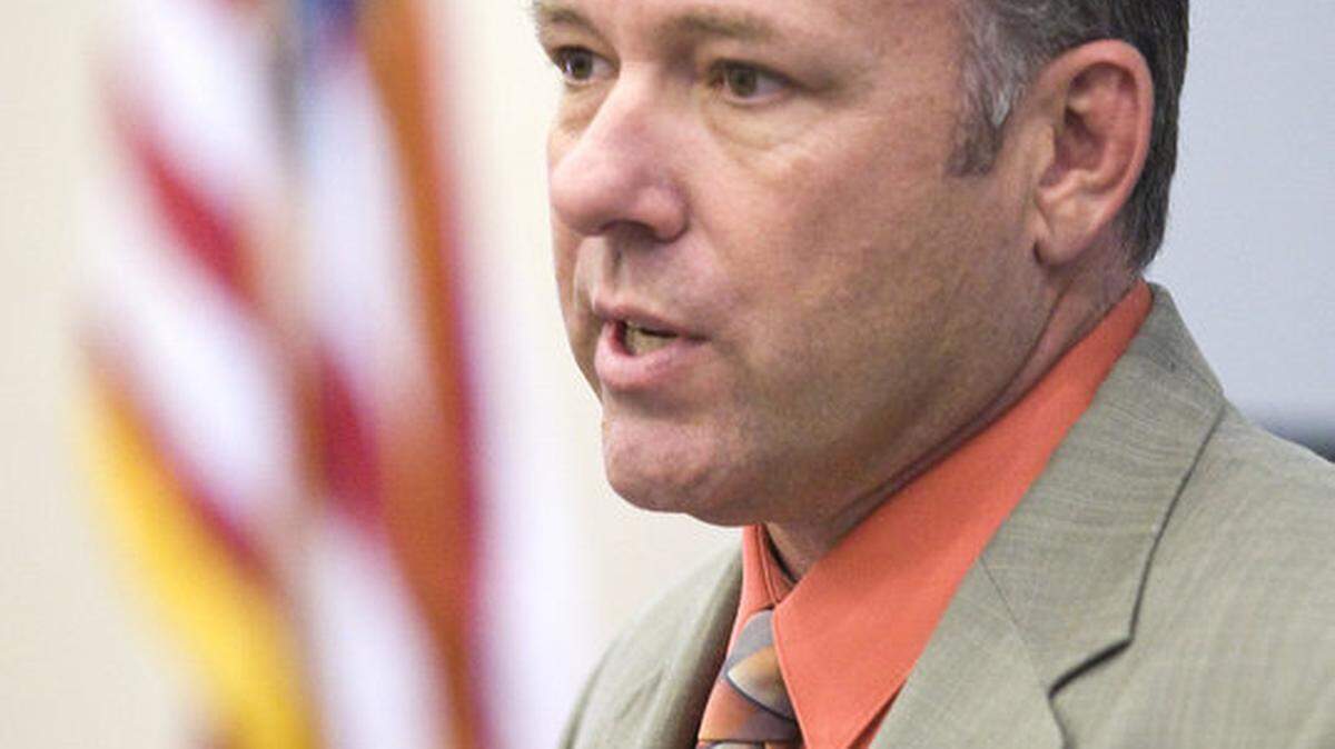 Paso Robles police Lt. Ty Lewis announces the arrests of four people during a news conference Wednesday on the investigation of Victor Hugo Sanchez's death.