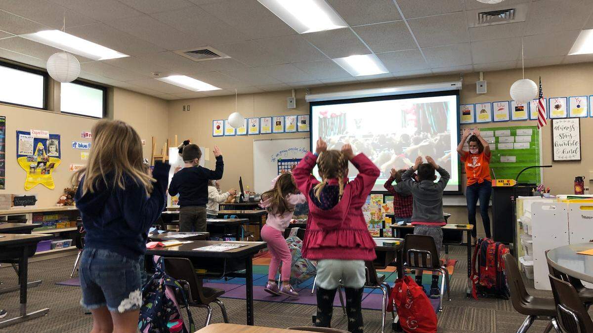 Students in Tiffany Sims’ kindergarten class at San Benito Road Elementary School dance during a morning song during their first in-person class since March 2020. Atascadero Unified School District reopened campus to transitional kindergarten through second graders on Monday, Nov. 2, 2020.