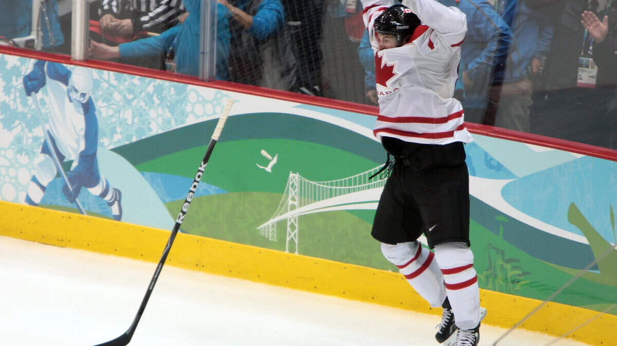 Canada's Sidney Crosby celebrates his overtime goal against the United States to secure the gold medal for Canada. (George Bridges/MCT)