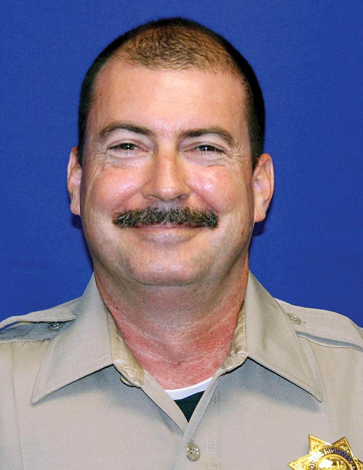 This undated photo released by the California Highway Patrol shows Brett Oswald, 47, of Paso Robles, who was killed Sunday June 27, 2010. Oswald was waiting for a tow truck to remove an abandoned car from a road near Paso Robles when Kaylee Weisenberg lost control of her Toyota Corolla and rear-ended his patrol car.