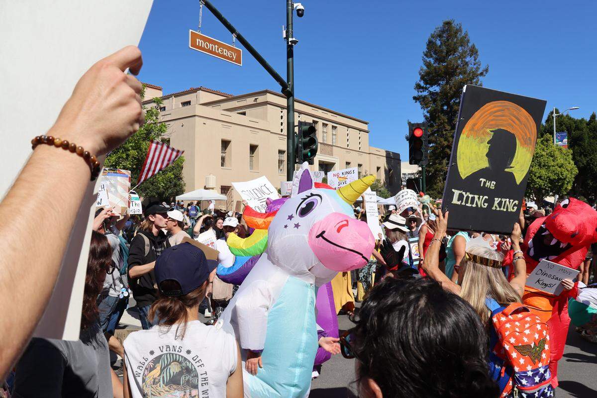 Thousands of people attended the No Kings rally in downtown San Luis Obispo to protest the Trump administration and support Prop. 50 on Oct. 18, 2025.