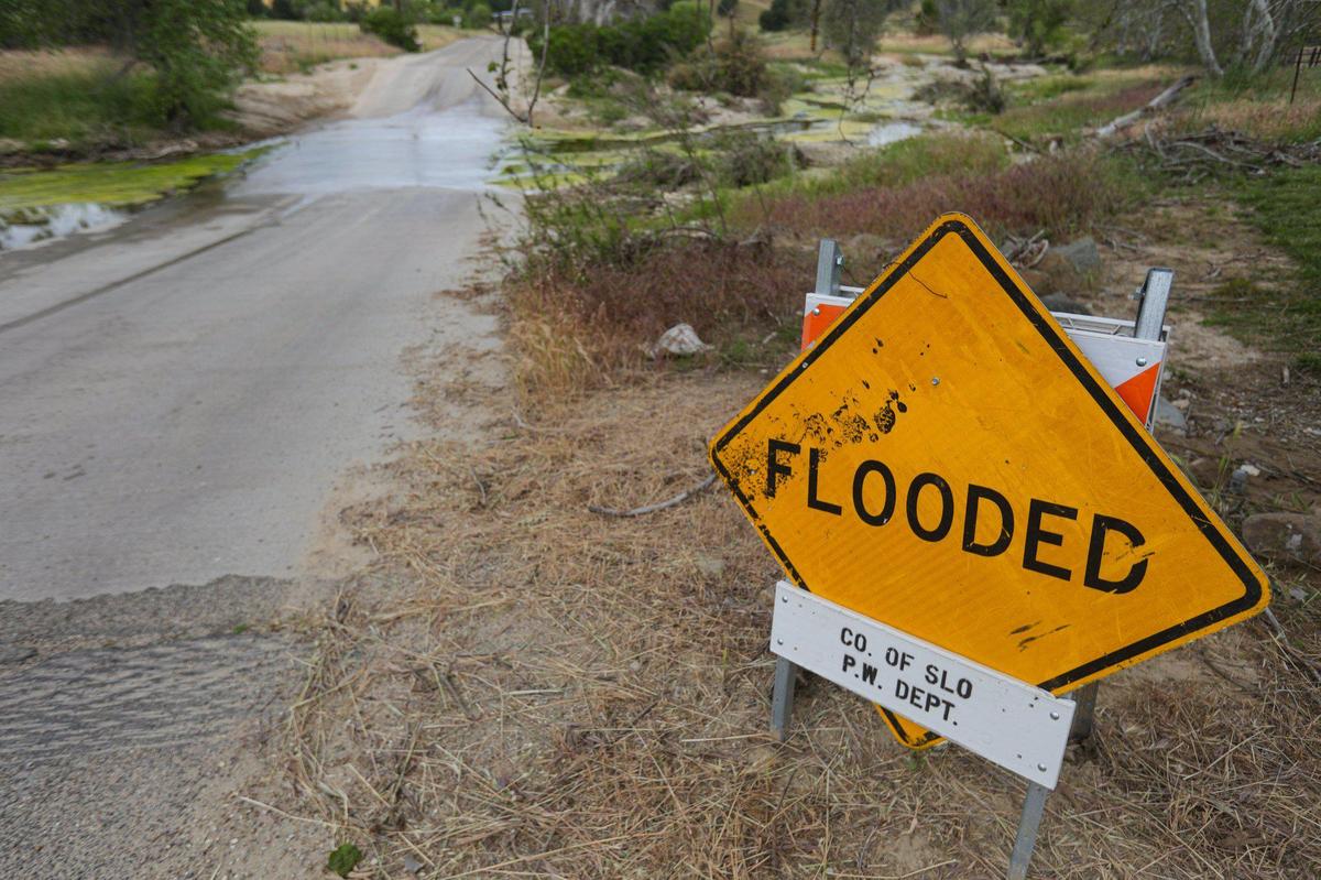 When the floodwaters from San Marcos Creek in San Miguel were at their peak, the level reached up to this sign, seen on May 9, 2023. Kyle Doan, 5, has been missing since he disappeared in the swollen creek on Jan. 9, 2023. Personal effects that belonged to the boy were recovered here, washed down to the second crossing of San Marcos Creek.