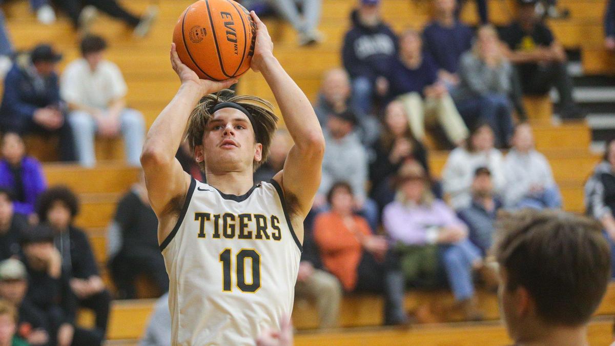 Eli Smiley Rooney shoots in San Luis Obispo’s 63-51 win over Santa Ynez in a boy’s basketball game on Jan. 20, 2023.