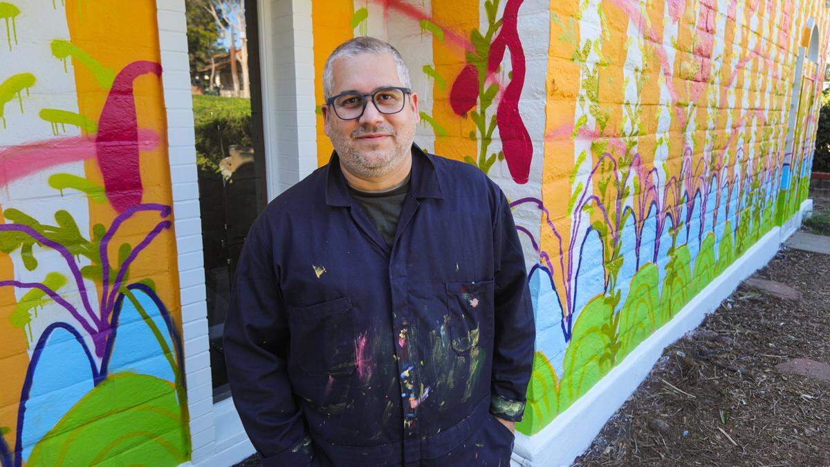 Artist Juan Alberto Negroni and a crew of college student assistants transformed the white walls of the San Luis Obispo Museum of Art into a mural. The work is titled “Pacificaribbean.”