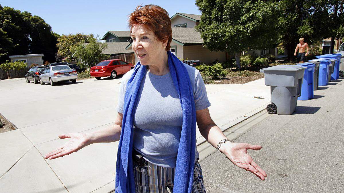 Linda White, co-chair of Monterey Heights Neighbors, lives on a street near Cal Poly where only four of the 13 homes are occupied by permanent residents. They hold potlucks with student neighbors to help improve relations.