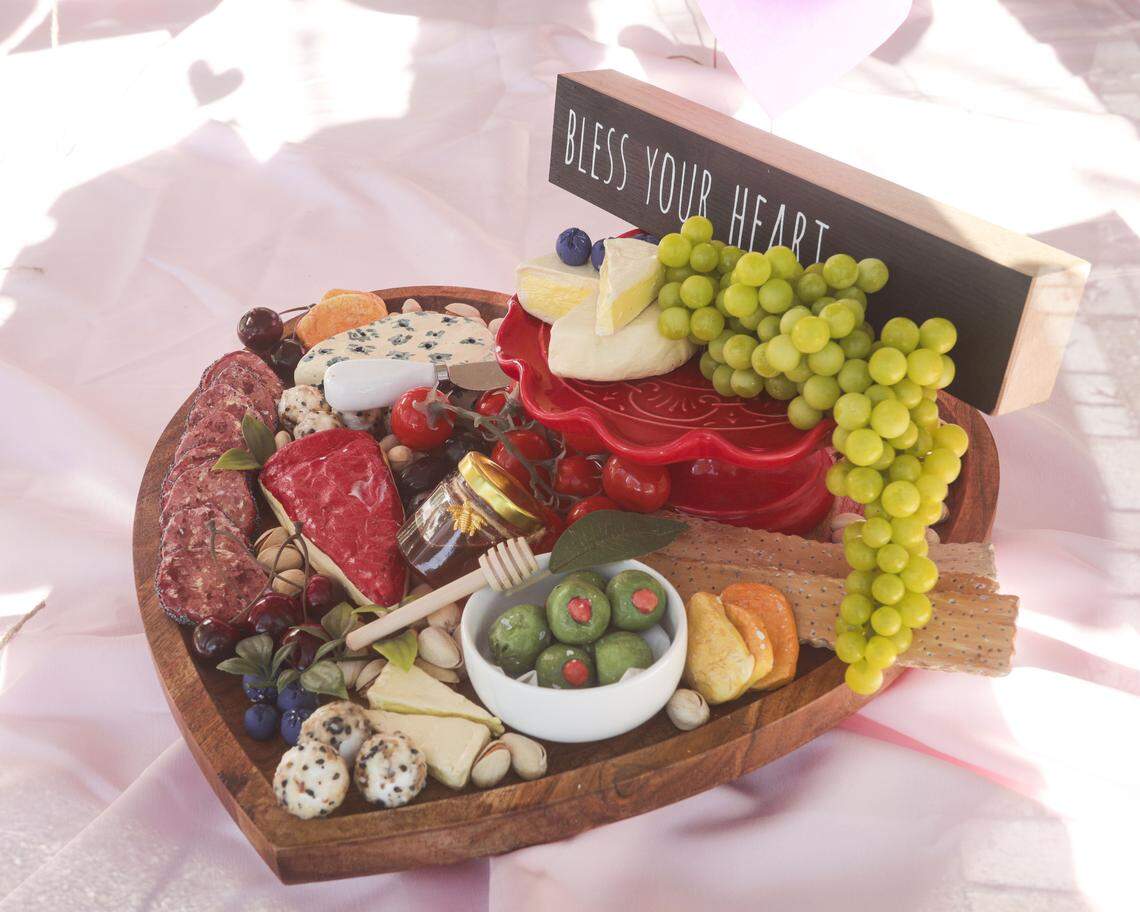 Graze, a business dedicated to providing grazing boards for events in SLO County, is coming soon to the AG Village. Seen here on Jan. 16, 2026. A decorative art plate is currently in the window.
