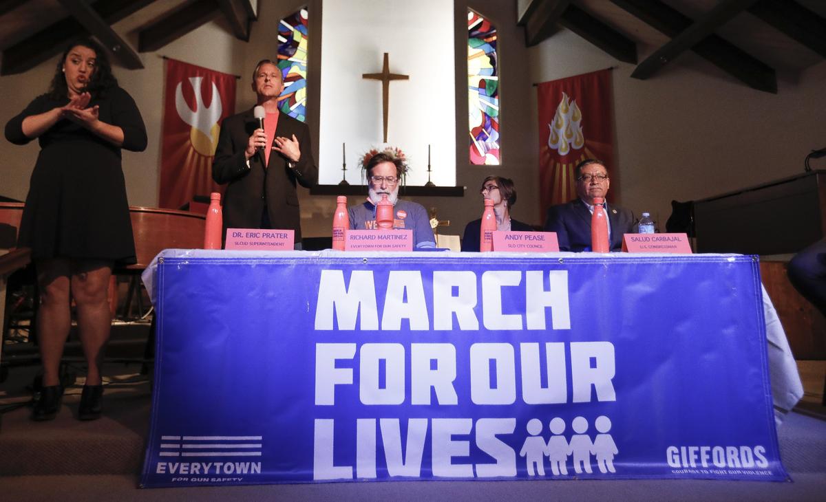 A town hall meeting on gun safety held May 26 at the United Church of Christ in San Luis Obispo, was hosted by student organizers of March for Our Lives and the Women's March. Speakers from left, Dr. Eric Prater, SLCUD Superintendent; Richard Martinez, Everytown for Gun Safety representative; Andy Pease, SLO City Councilperson; and California State Rep. Salud Carbajal.