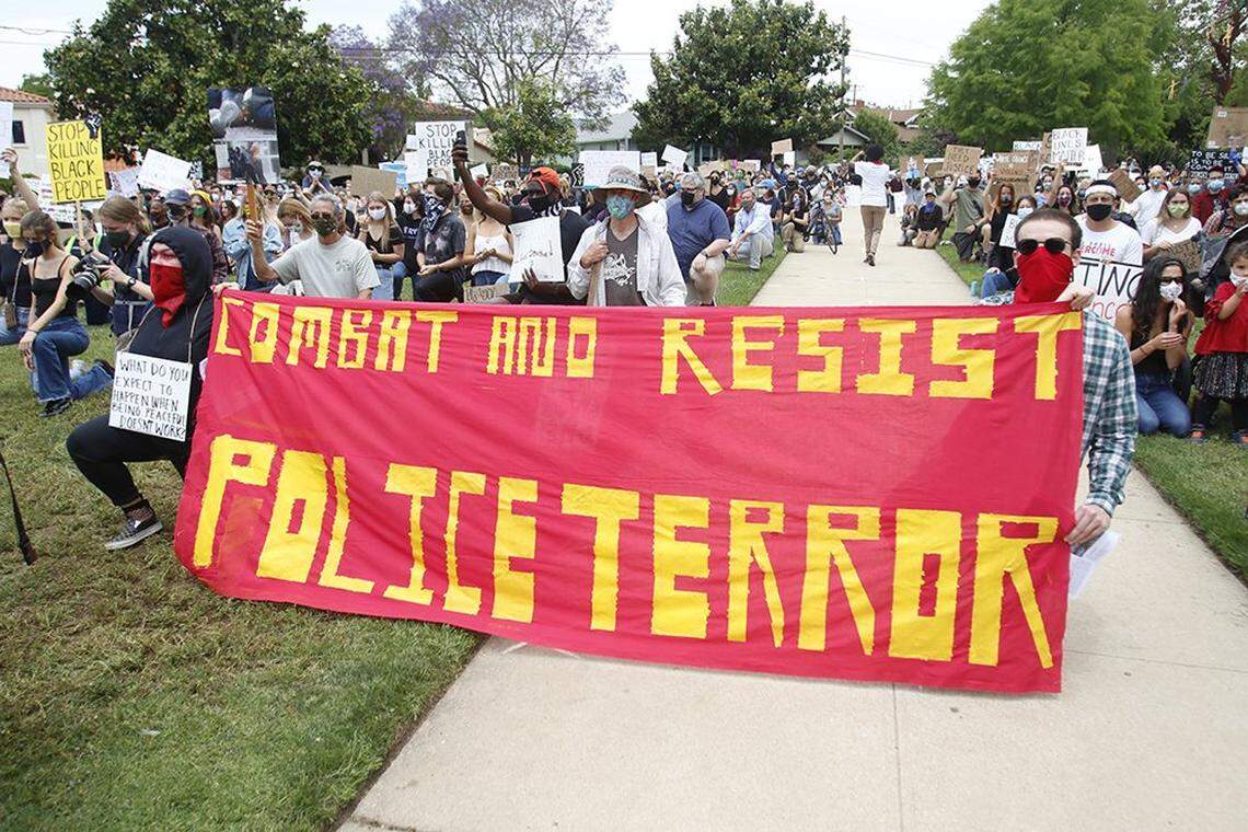 RACE Matters SLO County held a rally in San Luis Obispo to protest violence against people of color in America in response to the death of a Black man, George Floyd, while in police custody in Minneapolis.