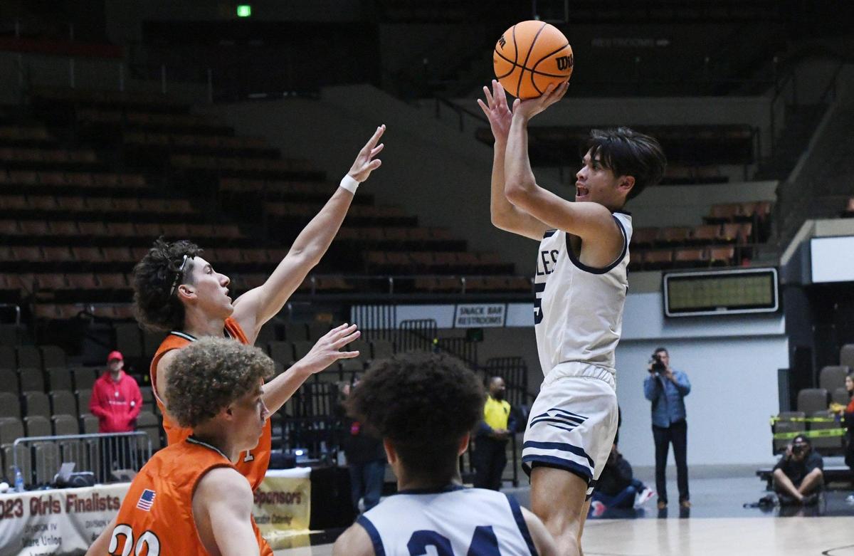 Arroyo Grande’s Zach Soriano, right, lines up a shot against Porterville at the CIF Central Section basketball championships Friday, Feb. 24, 2023, in Fresno. Arroyo Grande won 59-30.