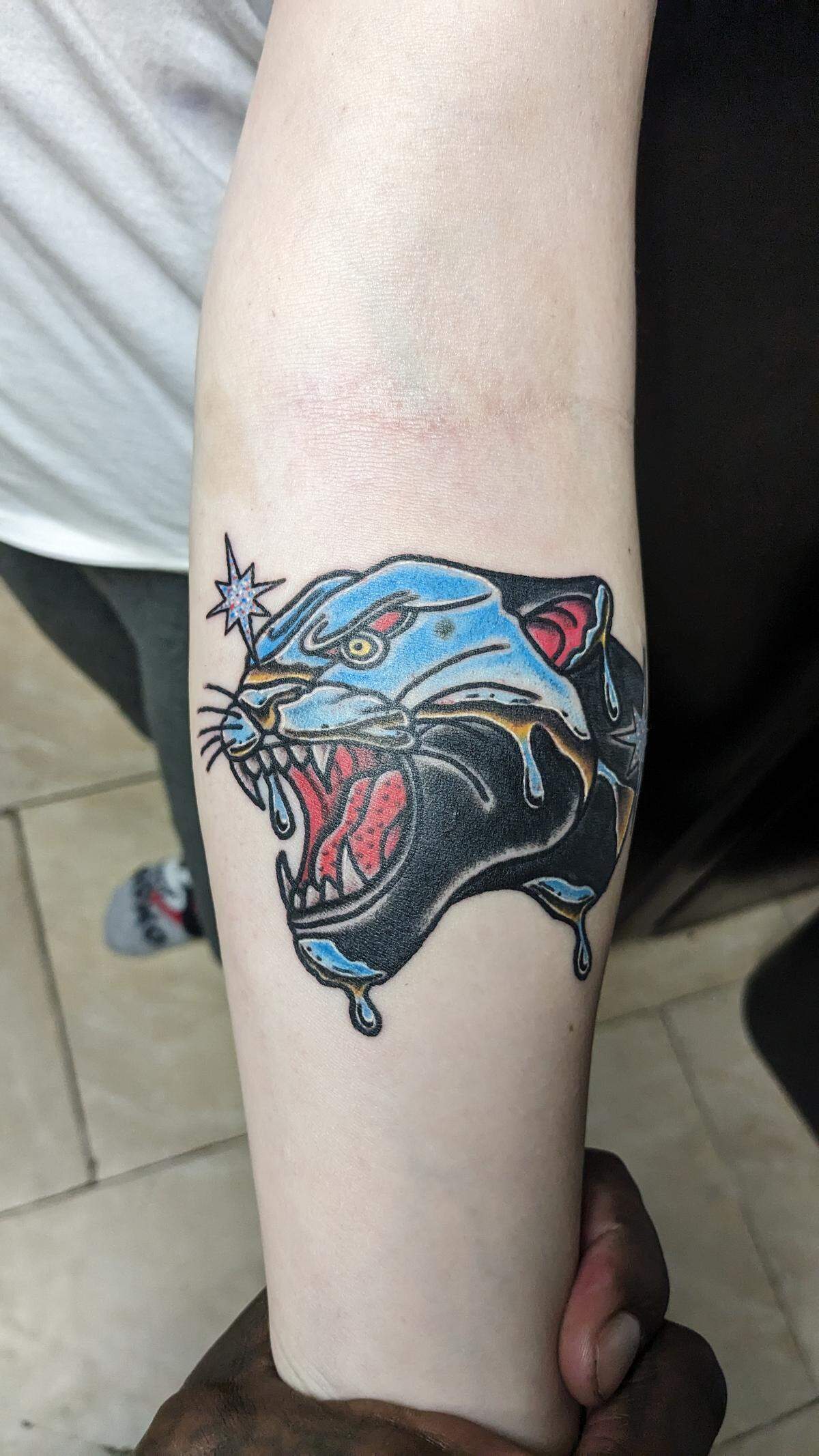 This fierce and colorful tattoo was created by Carlton Rodgers of Cambria’s new 3Left Tattoo studio.