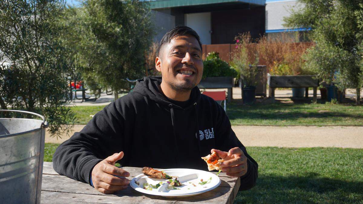 Fabian Tolan, 26, enjoys a lunch made by the People’s Kitchen of San Luis Obispo at 40 Prado Homeless Shelter. Tolan said he appreciates the meals, which are given to 40 Prado clients every day at noon 364 days a year.
