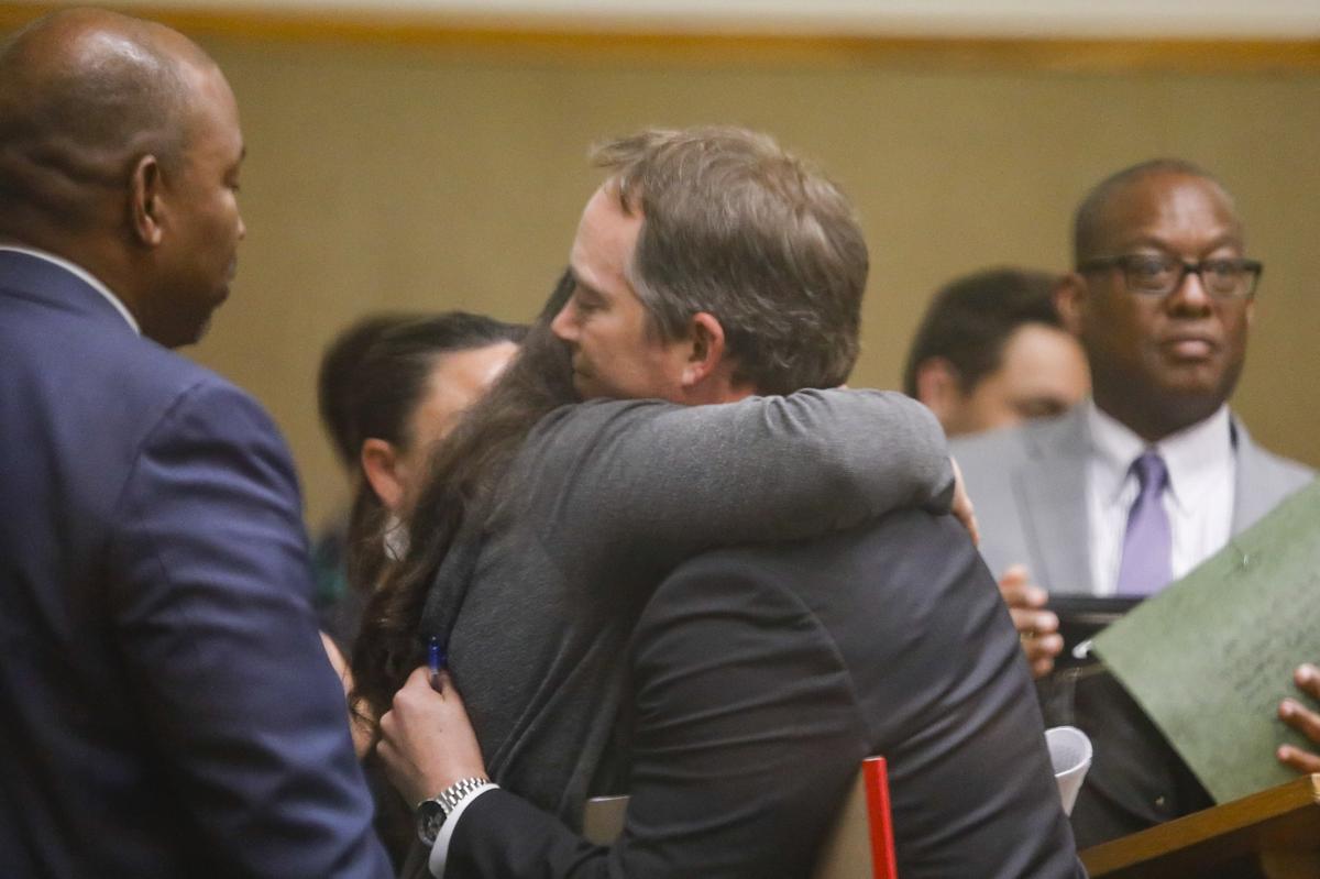 Deputy District Attorney Chase Martin hugs members of the Love family, including here Candice Love, after sentencing was pronounced for Gianna Brencola, 18, of Los Osos. Brencola was sentenced for the hit-and-run death of Cal Poly student Kennedy Love, who was riding a bicycle, on Foothill Boulevard in August 2017. Brencola fled the scene and was driving under the influence at the time.