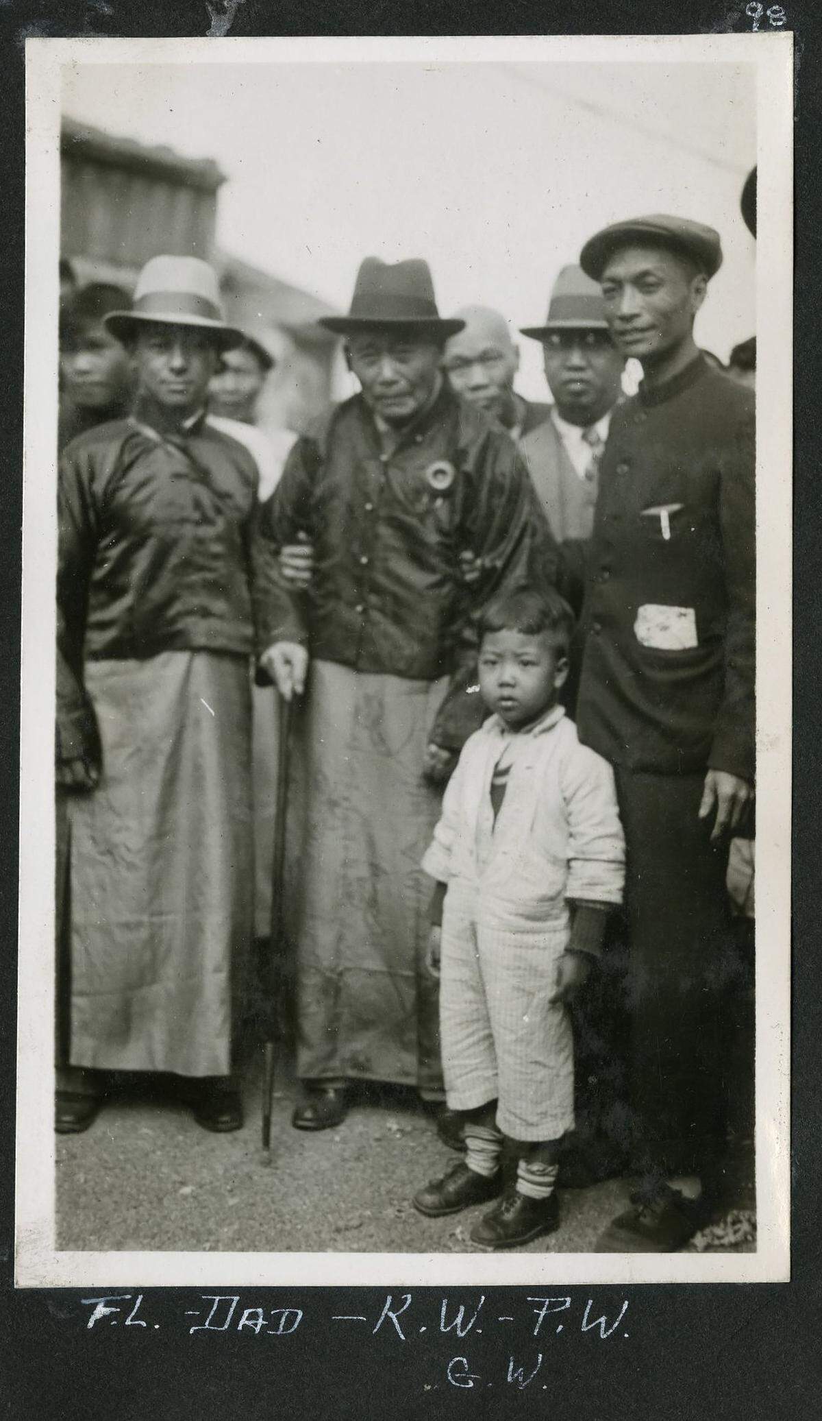 Ah Louis, 93, center with cane, and others during tour of China in 1933.
