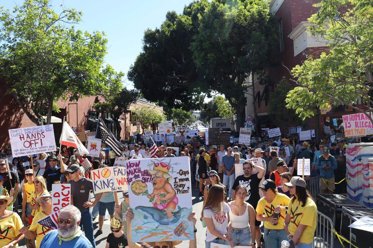 Thousands of people attended the No Kings rally in downtown San Luis Obispo to protest the Trump administration and support Prop. 50 on Oct. 18, 2025.