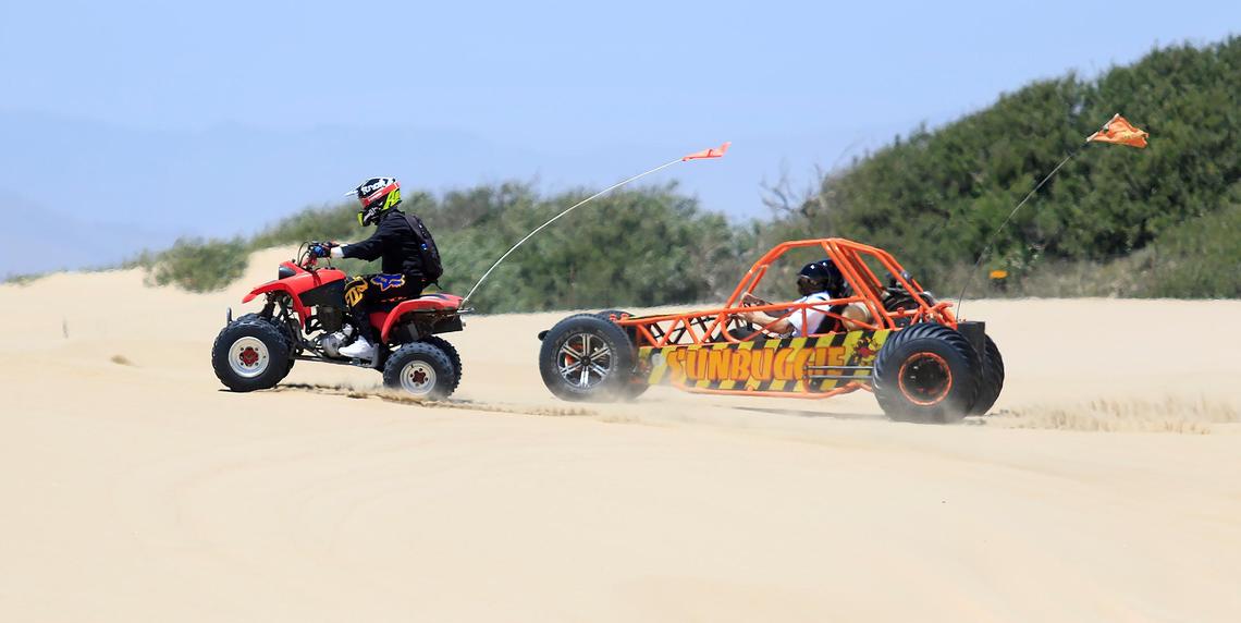 Riders explore the off-highway vehicle area of Oceano Dunes State Vehicular Recreation Area on Saturday, June 29, 2019.