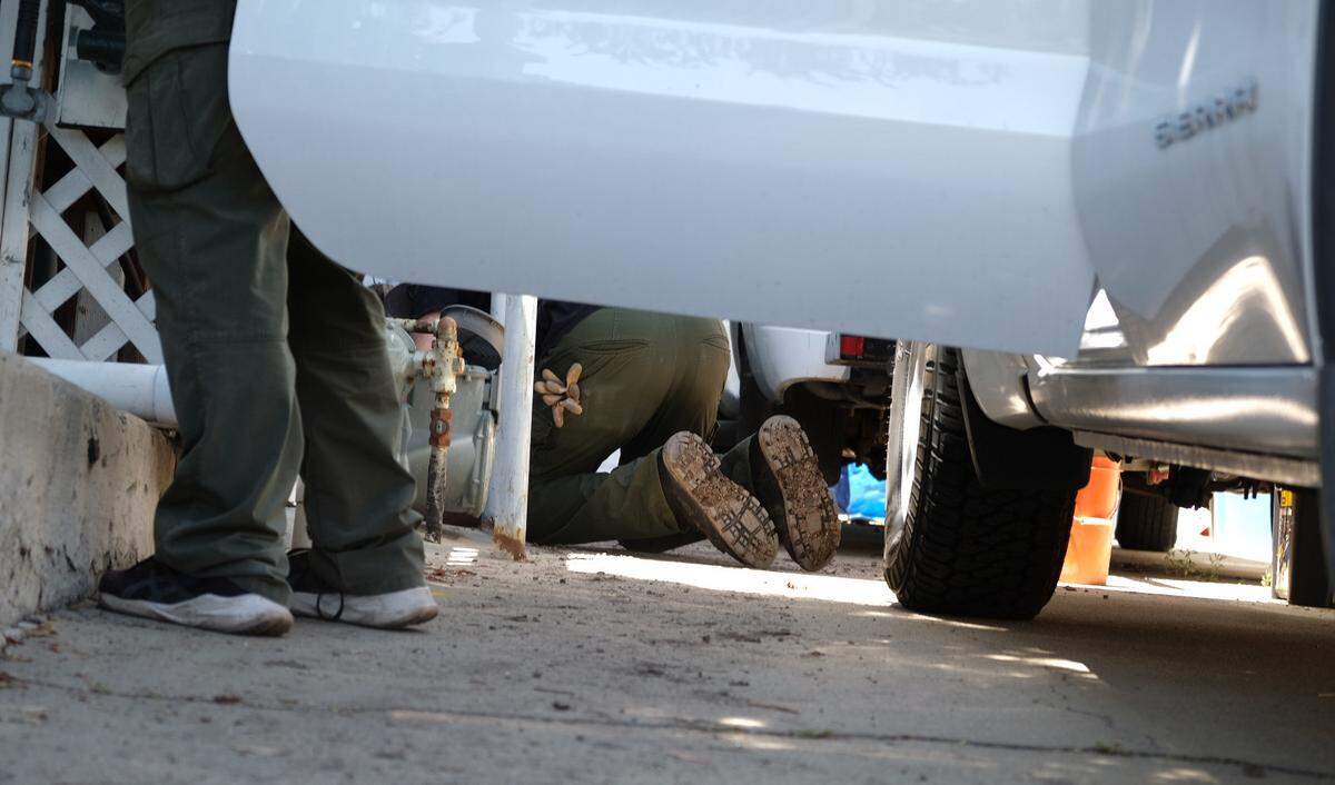 Forensic investigators from the San Luis Obispo County Sheriff’s Office work at Susan Flores’ house on Saturday, May 9, 2026, in the search for Kristin Smart. The investigators were focusing on the crawlspace under the house.